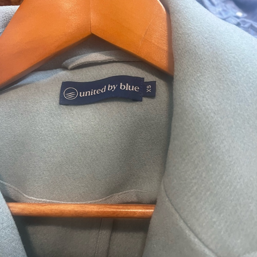 This is a United by blue coat size xs ( runs big) soft blue